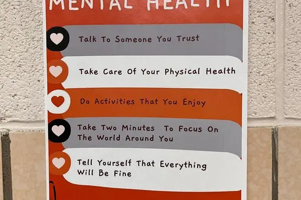 Poster displayed in school hallway providing mental health tips